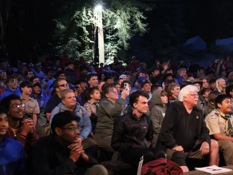 nightime audience at campfire